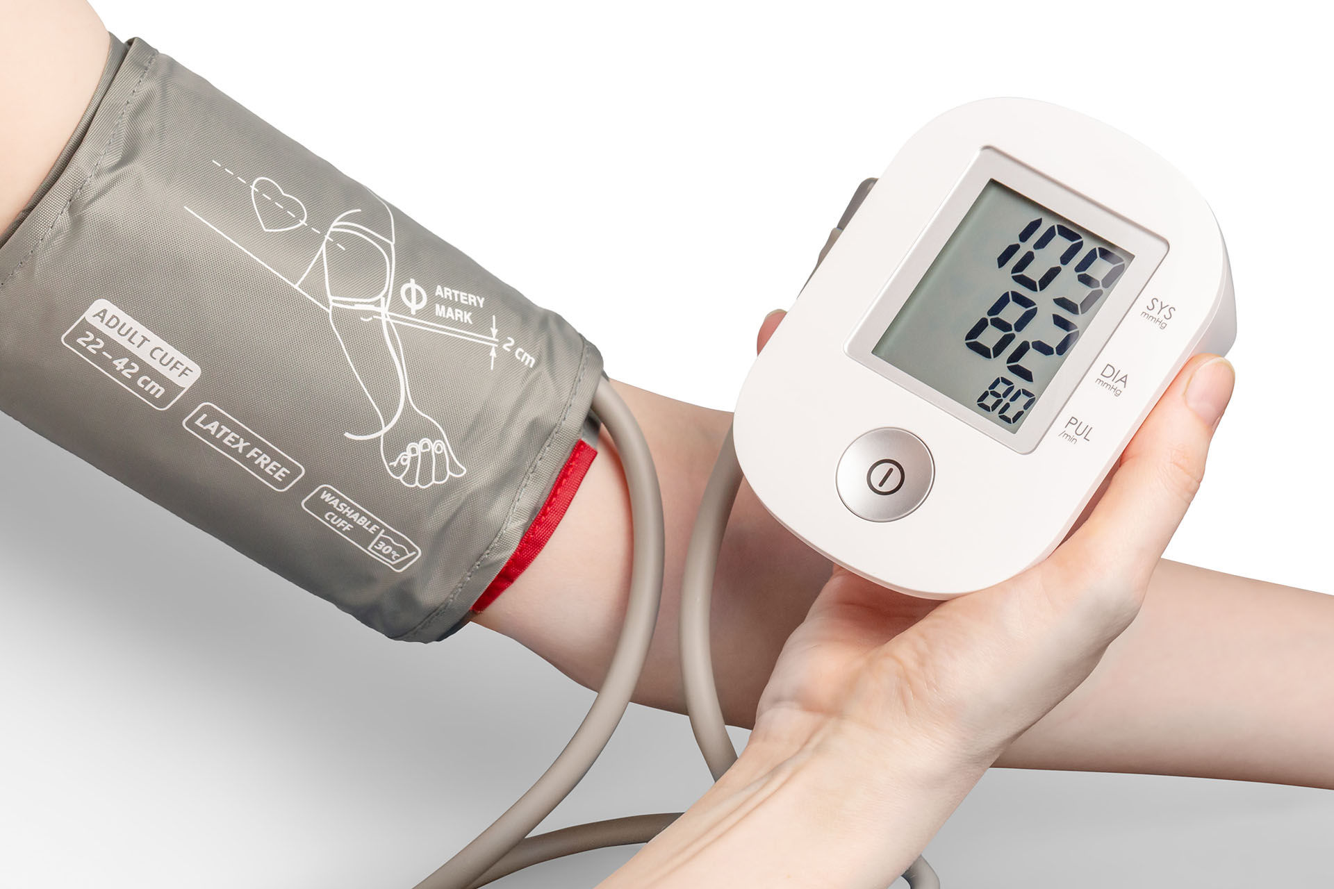 Picture of a person using a blood pressure cuff